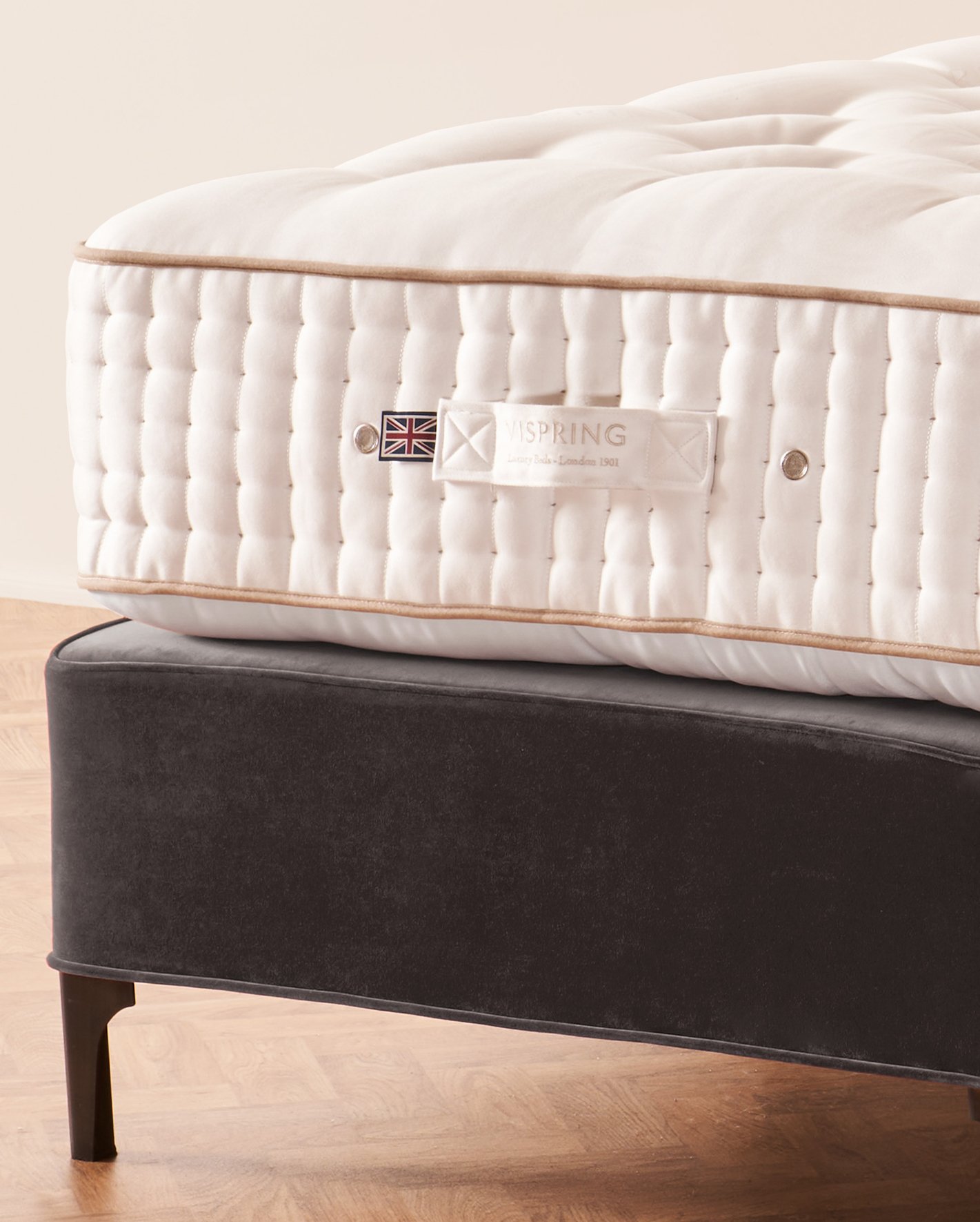 The Vispring Magnificence mattress on its divan in a serene bedroom